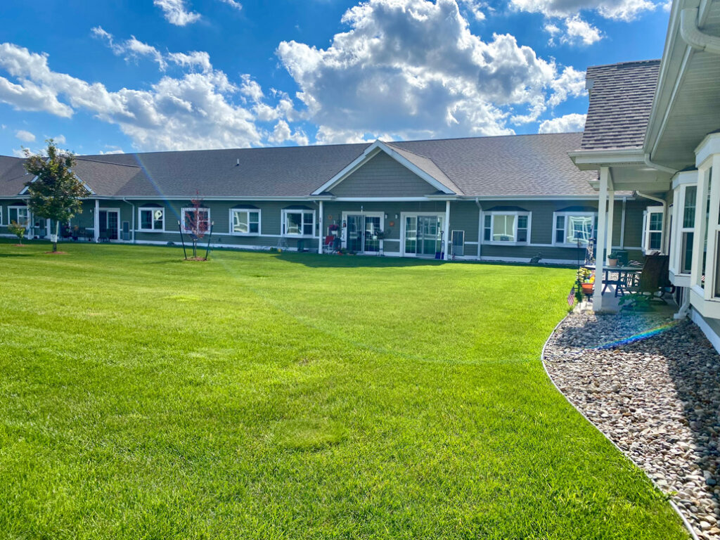 A photo of the green grass on the lawn outside Traditions of Saginaw
