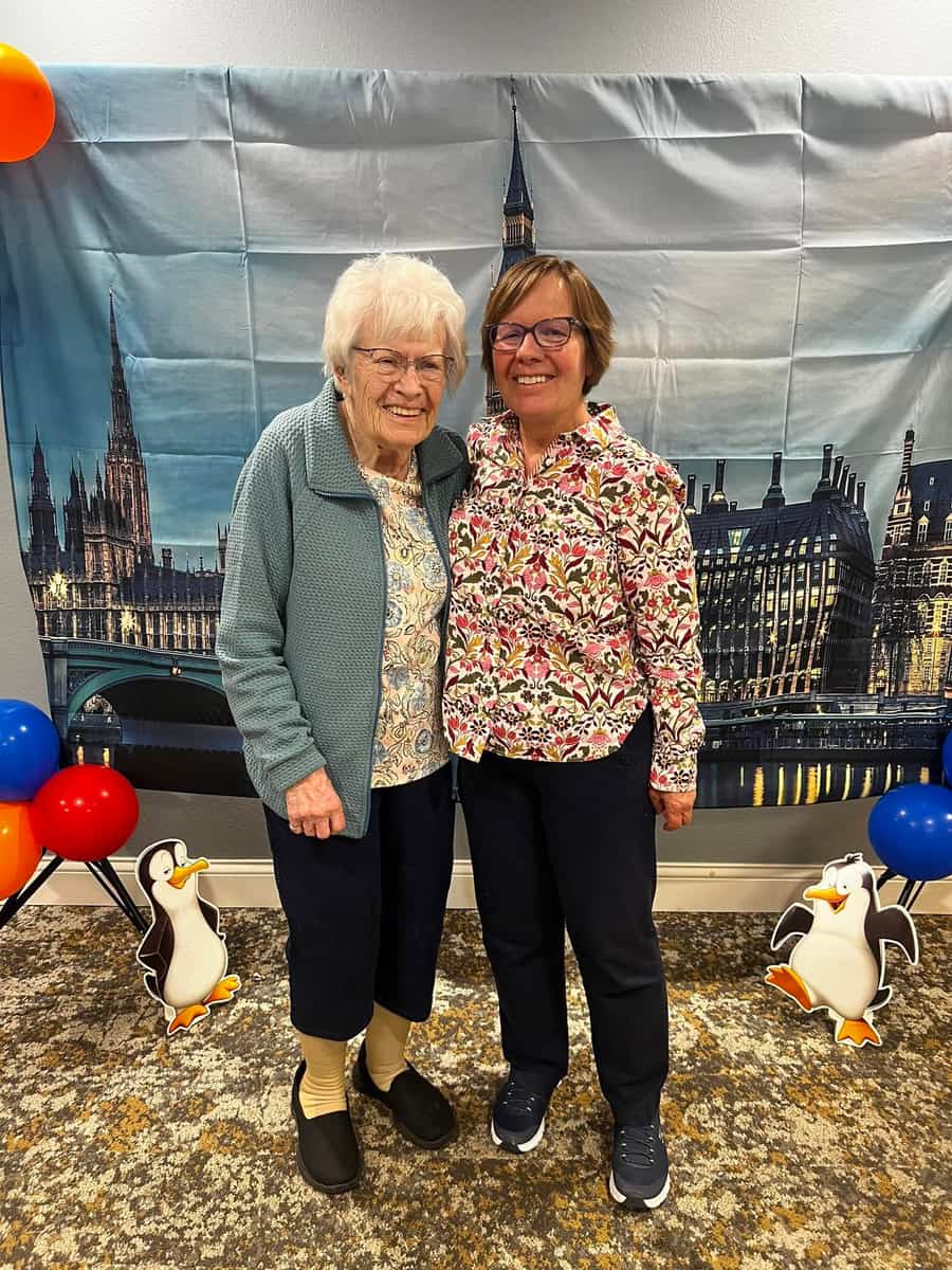 A resident poses with a family member during a Mother’s Day celebration at Traditions of Saginaw in Saginaw, Michigan.